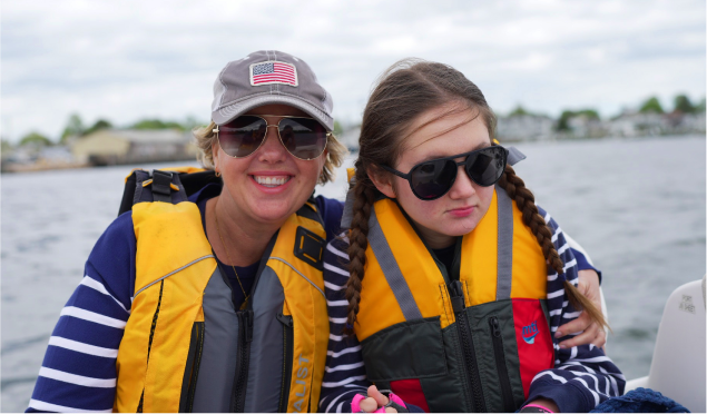 Ruby and her dad skiing