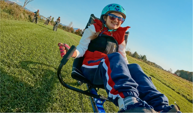 Ruby and her dad skiing