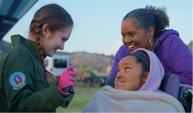 Ruby and her dad skiing