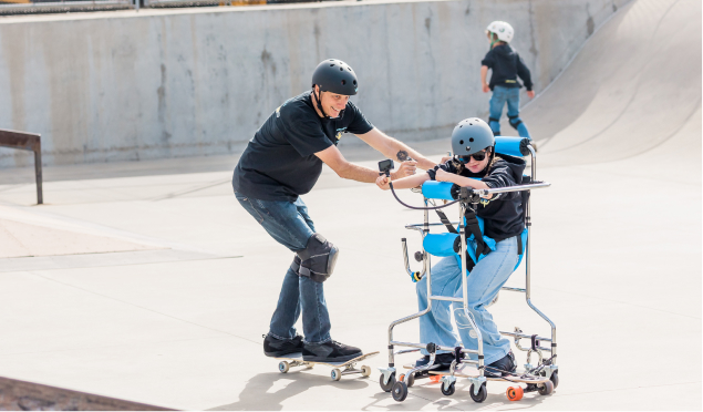 Ruby and her dad skiing